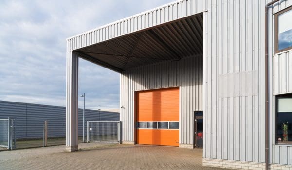 industrial warehouse with orange roller door